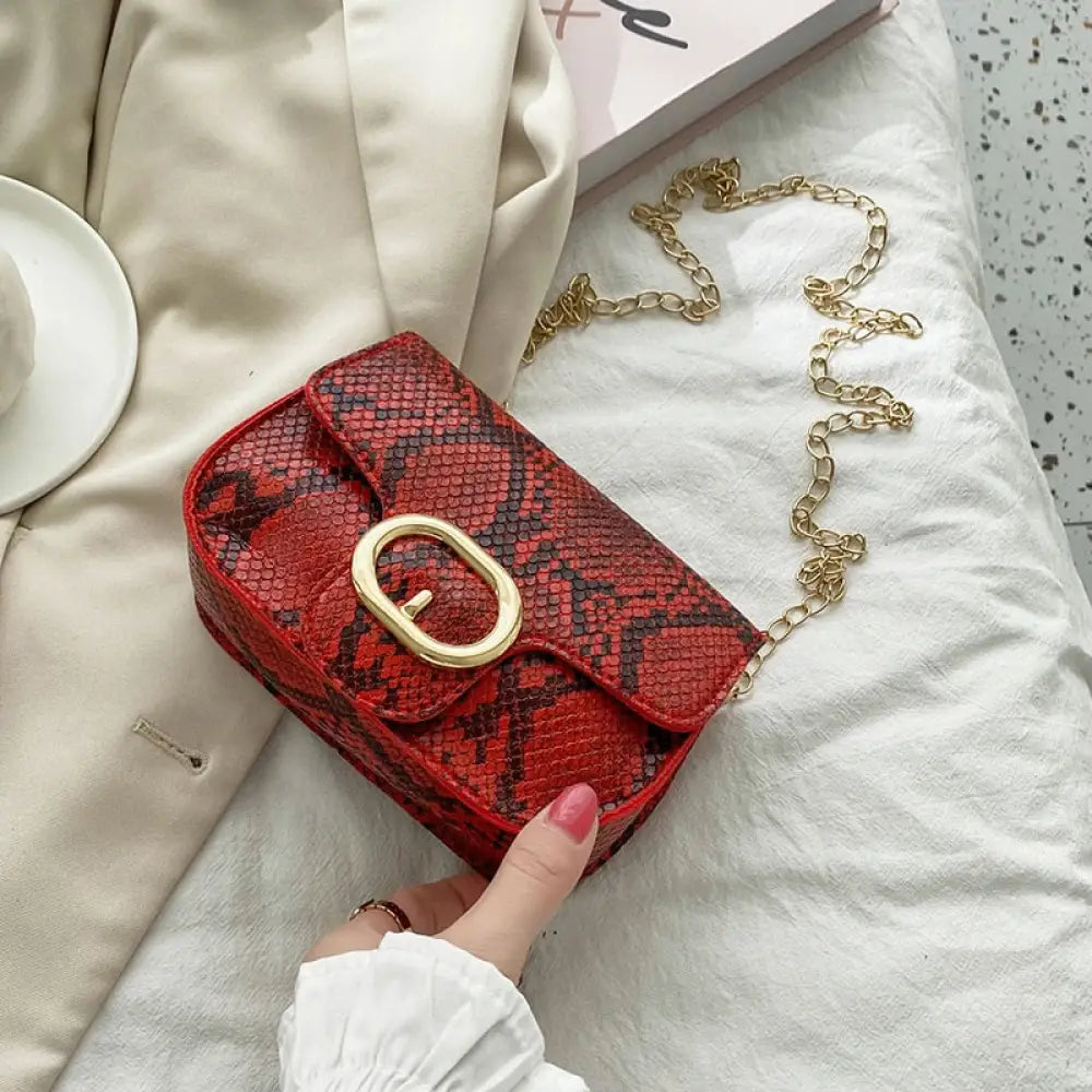 Red snakeskin clutch bag sale